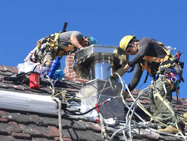 Protective chimney cap installed by North Ridgeville Chimney Sweep in North Ridgeville, OH